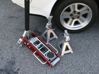 Illustration for article titled And You Will Know Us by the Trail of Parts: Using a Floor Jack and Jack Stands
